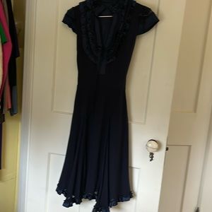 An adorable dress for any occasion. The below the knee length is charming.